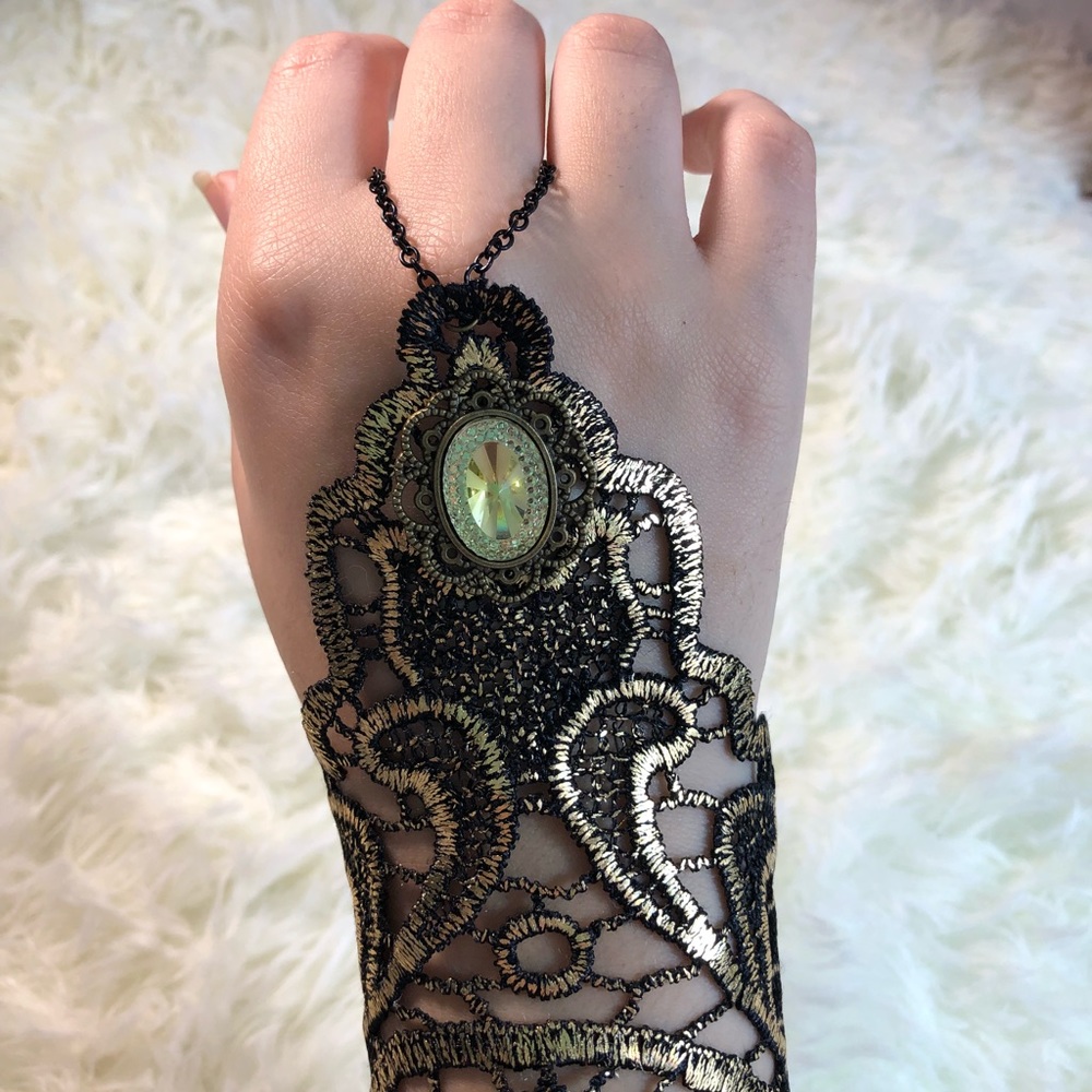 Glove like wrist covering gold and black